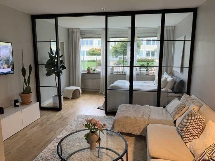 hiết kế nội thất chung cư mini có vách ngăn kính hiện đại.