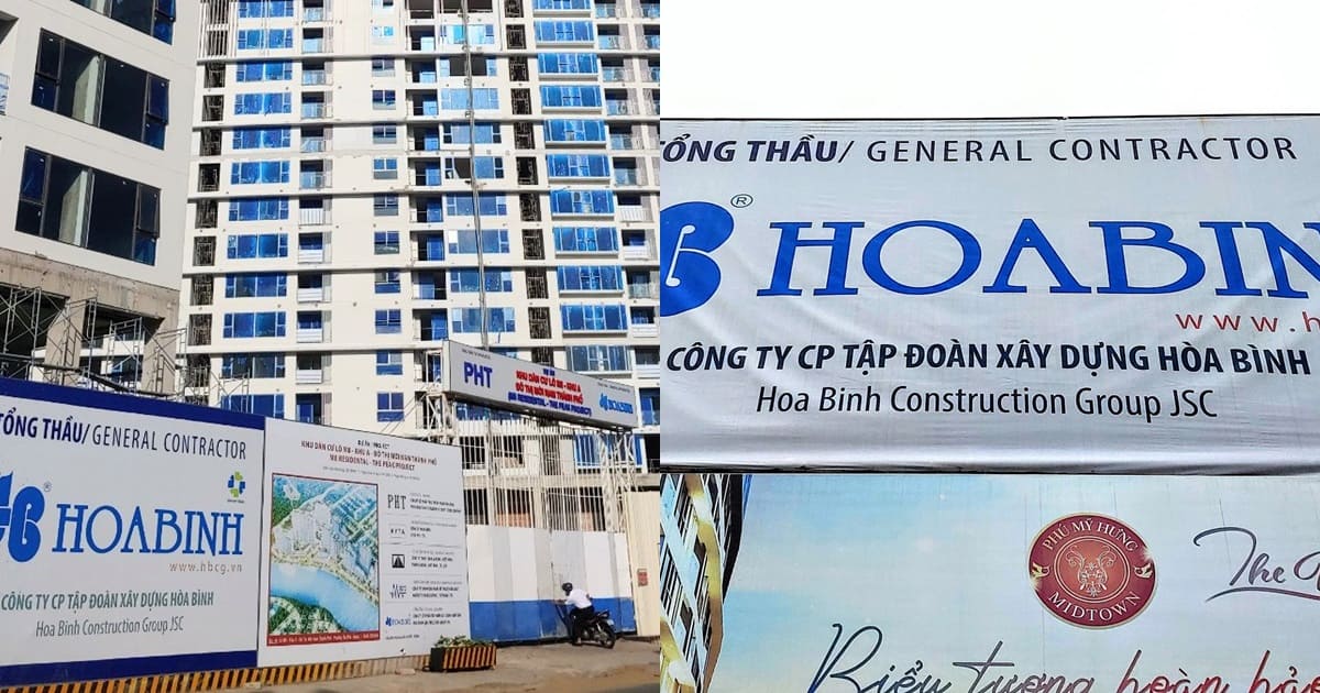 Công trình cao tầng do Công ty Xây dựng Hòa Bình thi công, với biển hiệu thể hiện vai trò tổng thầu và thương hiệu HBC nổi bật.