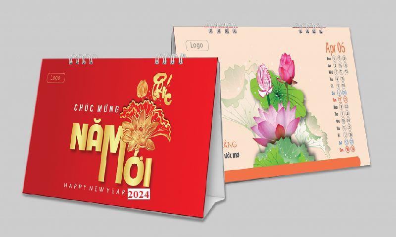 Hai cuốn lịch bàn Cao Hoàng Gia: bìa đỏ chữ Phúc Lộc vàng và trang tháng 4 in hoa sen nghệ thuật.