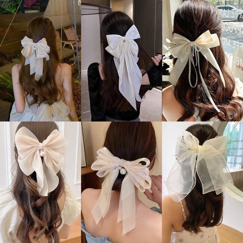 Mẫu kẹp tóc hottrend nơ vải lụa thướt tha cho phái đẹp