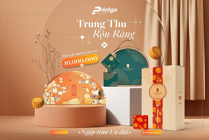 Ba mẫu hộp bánh Trung Thu cao cấp do Printgo thiết kế với tông màu cam, xanh và vàng; hiển thị ưu đãi thiết kế miễn phí và slogan “Trung Thu Rộn Ràng”.