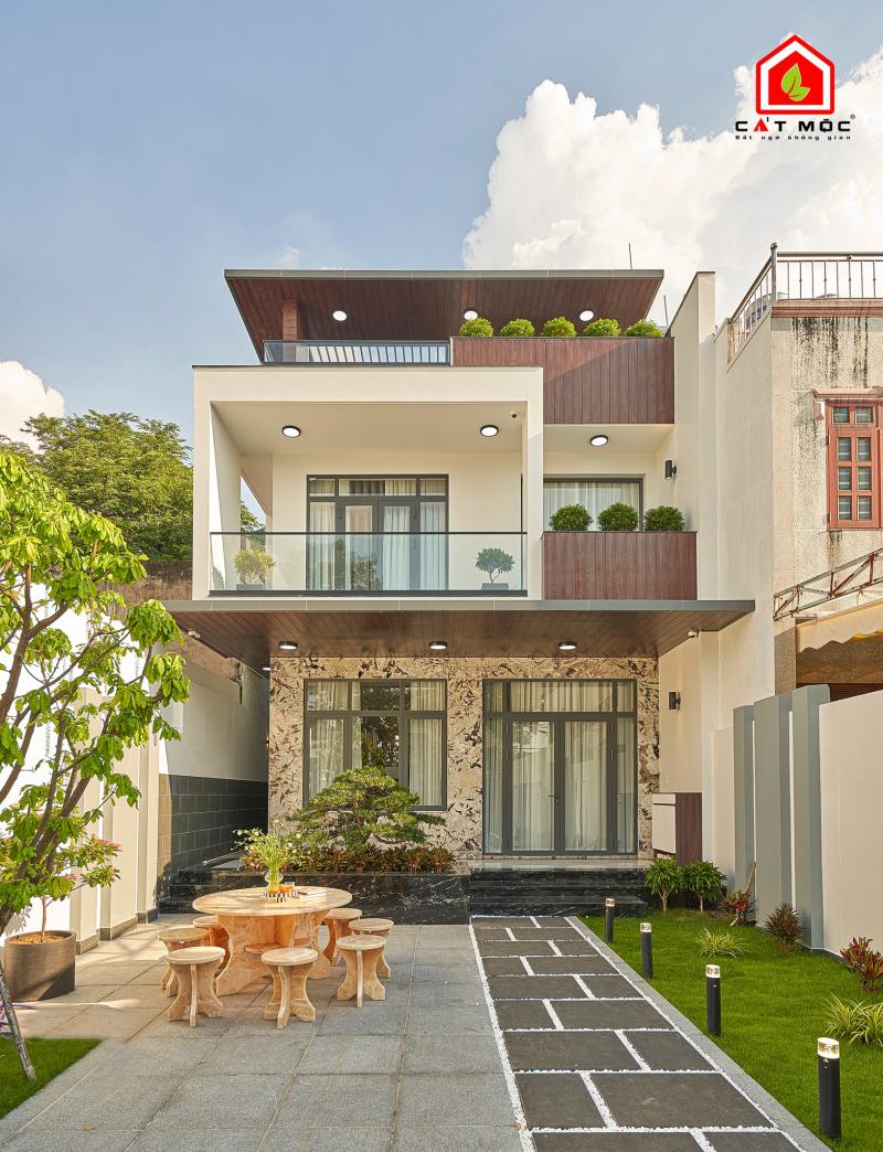 Mẫu thiết kế nhà ở hiện đại, thi công hoàn thiện bởi công ty thiết kế nhà đẹp Cát Mộc Group với phong cách kiến trúc bền vững và tinh tế.
