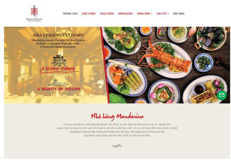 Giao diện thiết kế website ẩm chuỗi nhà hàng được thiết kế bởi Greensoft, hiển thị chi nhánh, chương trình tích điểm và chức năng đặt bàn – giao hàng.